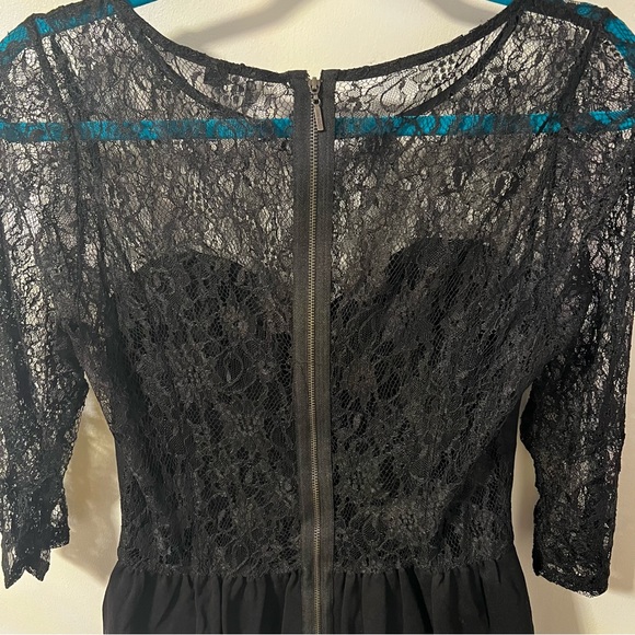 Guess Peplum Top With Lace and Zipper Back - Picture 4 of 8